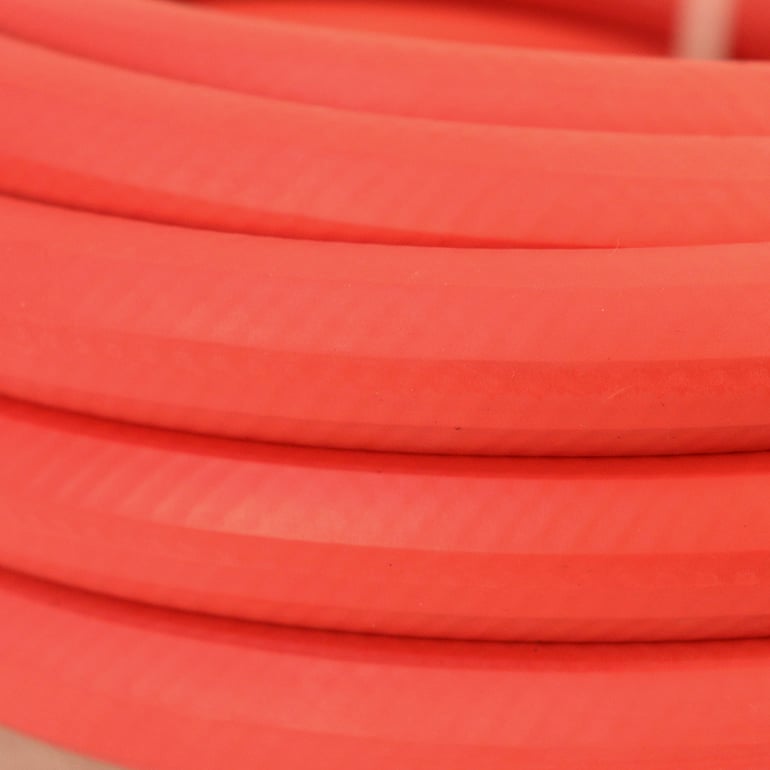 Apex Pro All rubber industrial duty hose coil close up
