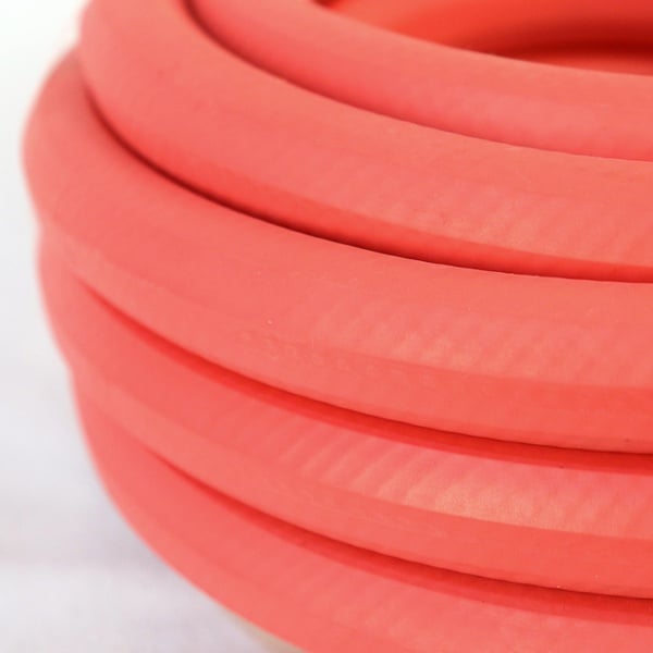 Apex Pro All rubber industrial duty hose coil close up